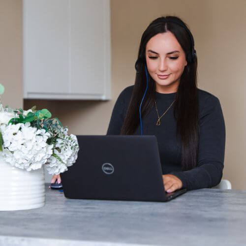 colleagues at a laptop